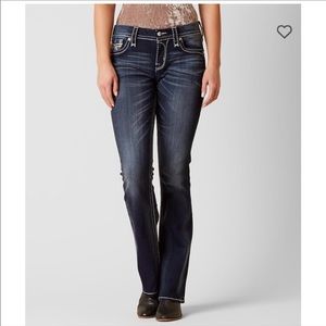 Mid rise fly stretch jeans